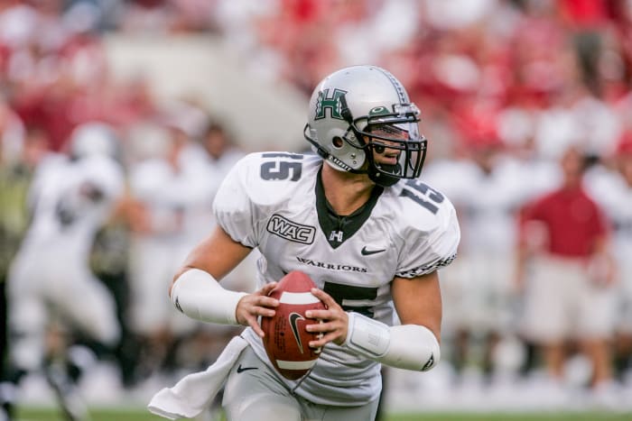 Brennan's Hawaii totals: 14,193 passing yards, with 131 TDs.